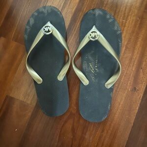Michael Kors Black and Gold Flip Flops /Sandals